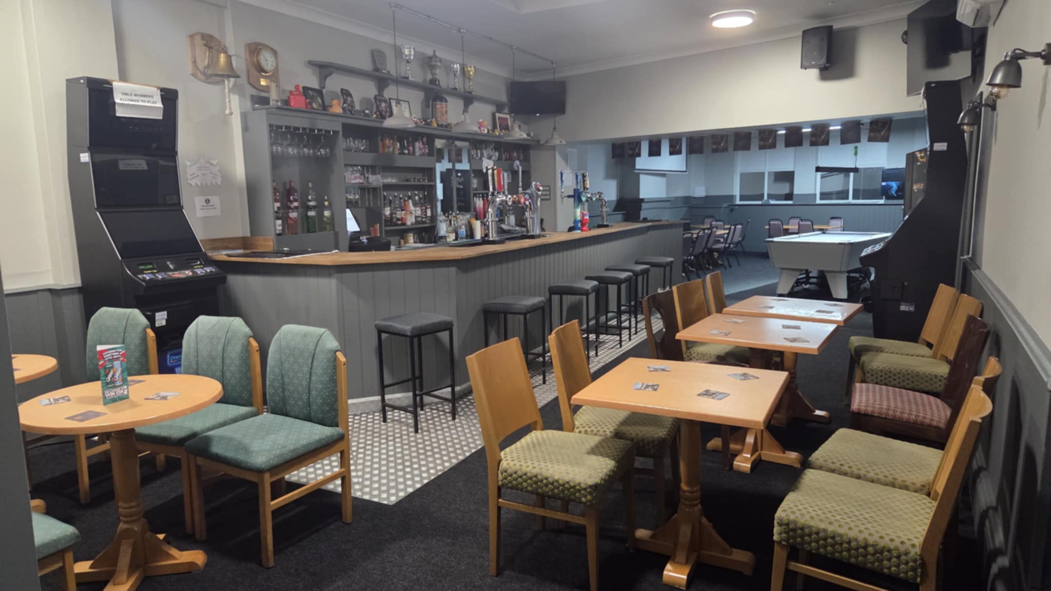 Pool hall at Wisbech EX Services Club showing multiple pool tables