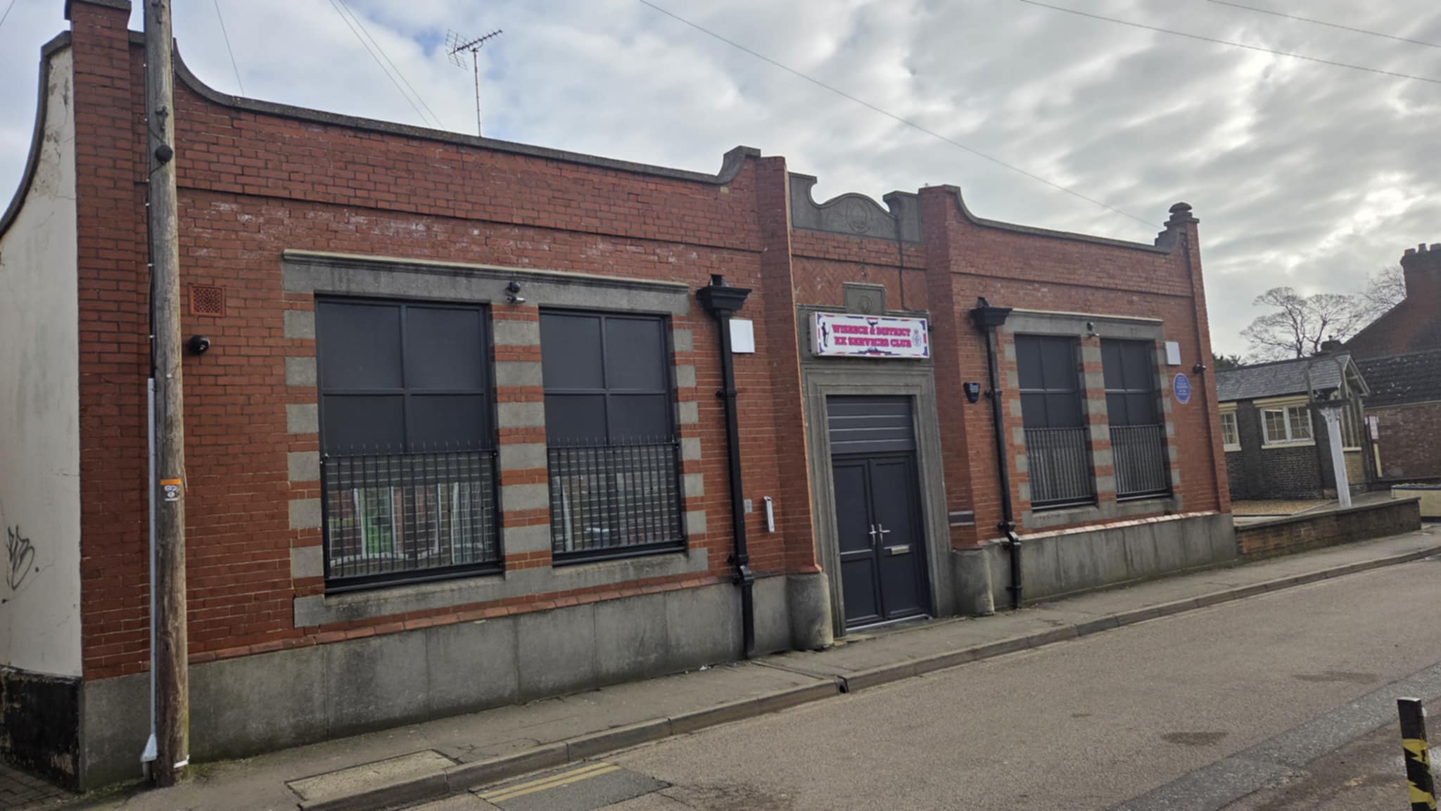 Function room at Wisbech EX Services set up for a party with dartboards and seating